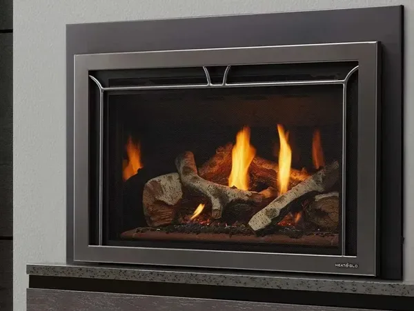 Sealed gas fireplace installed in a living room wall