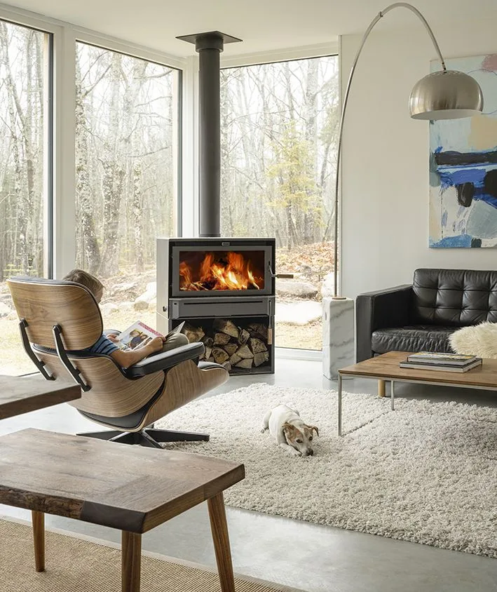 Gas fireplace burning in a bright living room