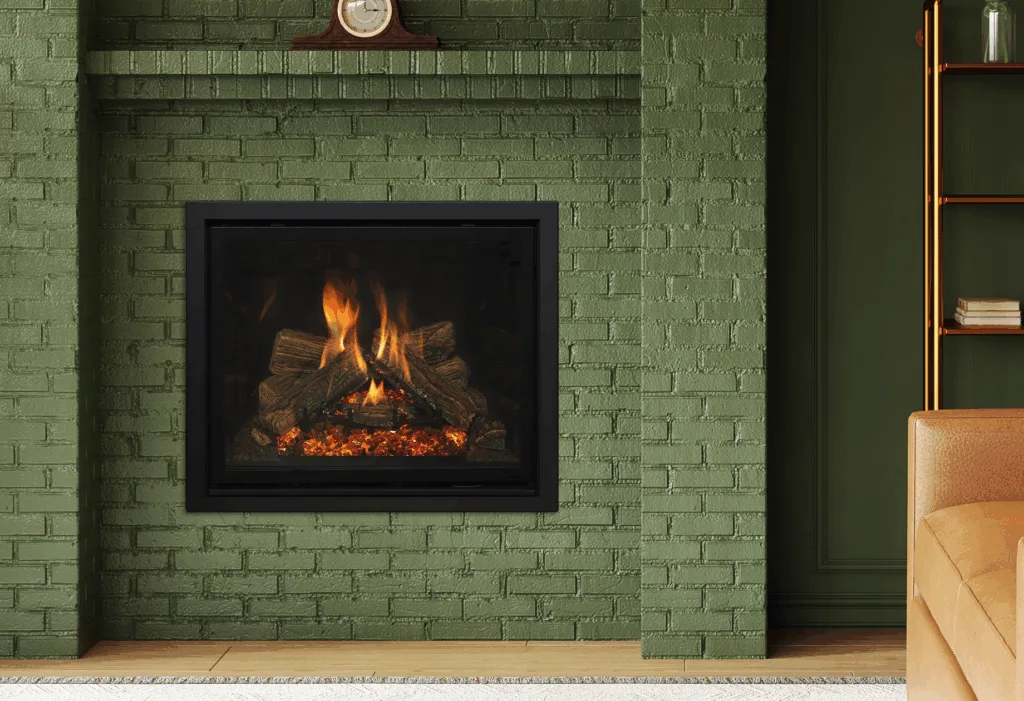 Wood fireplace set into a green painted brick wall
